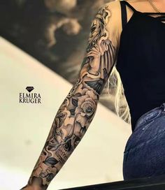 a woman with a tattoo on her arm