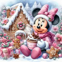 a cartoon mouse is sitting in front of a gingerbread house and holding a cupcake