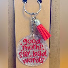 a keychain with the words good mom's say bad words on it