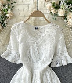 White A line lace v neck dress Fabric: lace Color: white Size: S, M, L, XL S length 125 bust 88 waist 68 sleeve length 32 M length 126 bust 92 waist 72 sleeve length 33 L length 127 bust 96 waist 76 sleeve length 34 XL length 128 bust 100 waist 80 sleeve length 35 2XL length 129 bust 104 waist 84 sleeve length 36 Delicate Lace V-neck Dress For Brunch, Feminine V-neck Delicate Lace Top, Summer V-neck Lace Dress, Scalloped Lace V-neck Dress For Brunch, Elegant White V-neck Lace Top, White Feminine Lace Top, Elegant V-neck Lace Dress For Brunch, Feminine V-neck Delicate Lace Dress, White V-neck Lace Dress With Lace Trim