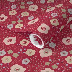 an image of a red flowered fabric with white and blue flowers on the side