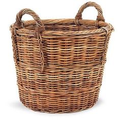 a brown wicker basket with handles on a white background