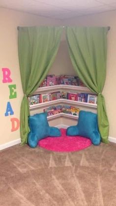 a child's bedroom with green drapes and pink rug