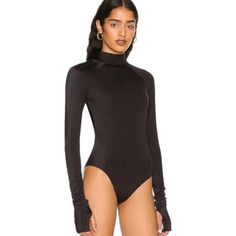 We Are Hah Swim Rash Guard Long Sleeve Swimsuit We Are Hah Gloves Off Black One Piece Swimsuit Bodysuit New With Tags Sleek Fitted Bodysuit For Swimming, High Stretch Club Leotard, High Stretch Leotard For Club, Sleek Fitted One-piece Bodysuit, Black Fitted Nylon Bodysuit, Fitted Black Bodysuit For Club, Fitted Black Nylon Bodysuit, Chic Black Bodysuit With Thumbholes, Chic High Stretch Bodysuit For Swimming