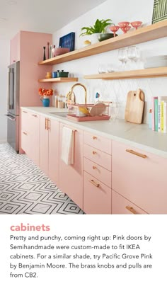 a kitchen with pink cabinets and shelving above the countertop is featured in this article