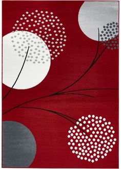 a red rug with white and grey circles on it's side, in front of a dark red background