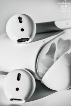 three toothbrushes sitting next to each other on top of a white countertop