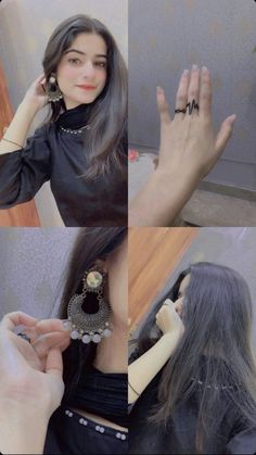 a woman with long gray hair is wearing rings and holding her hand up to her ear