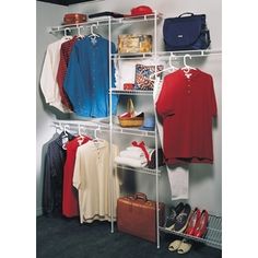 an organized closet with clothes, shoes and handbags on shelving units in the corner