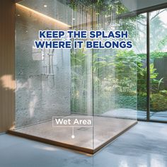 a glass shower with the words, keep the splash where it belongs wet area in blue