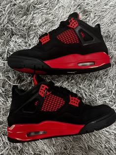 Elevate your sneaker game with these stylish Air Jordan 4 Retro Mid Red Thunder sneakers. Crafted with a mid-top shoe shaft style, these sneakers feature a striking black, multi-color, multi-color, and crimson colorway that is sure to turn heads. The style code, CT8527016, and release date, 20220116, add to the exclusivity of these sneakers. These sneakers are perfect for any athletic occasion and are designed with comfort in mind, making them an ideal choice for any active man. With a US shoe size of 4.5, these sneakers are a great fit for those with smaller feet. Don't miss out on the chance to own these stunning Air Jordan 4 Retro Mid Red Thunder sneakers. Red Quince Shoes Sneakers, J 4s, Jordans For Boys, Cute Dunks, Red And Black Jordans, Women's Jordans, Men Shoes Aesthetic, Air Jordan 4 Thunder, Red Thunder 4s