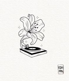 a black and white drawing of a flower on top of a turntable with vinyl