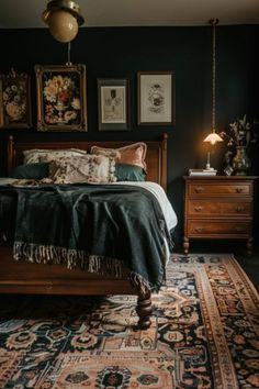 a bed sitting in a bedroom on top of a rug next to a dresser and lamp