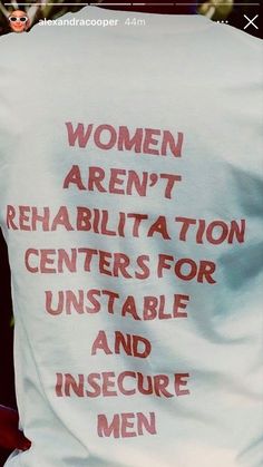 the back of a woman's t - shirt that reads, women aren't rehabiltaton centers for unstable and insure men