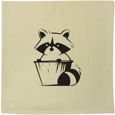 a raccoon sitting on top of a wooden bucket filled with something black and white