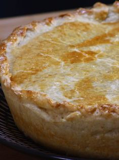 a close up of a pie on a plate