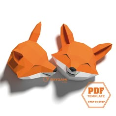 two paper fox heads are shown in the shape of an origami