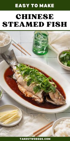 an image of steamed fish on a plate with chopsticks and rice in the background