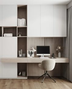 a desk with a computer on top of it in front of a book shelf and bookshelf