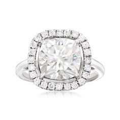 Ross-Simons - 3.50 ct. t. w. Moissanite Square Halo Ring in Sterling Silver. Size 6. A ring with this much elegance is impossible to be overlooked. A pristine 3.20 carat square cushion-cut moissanite is beautifully accompanied by a halo of .30 ct. t. w. round brilliant-cut moissanite gems in sterling silver. 1/2" wide. Moissanite ring. Silver Square Cut Jewelry With Halo Setting, Luxury Square Cut Rings With Halo Setting, Luxury Square Cut Halo Jewelry, Sterling Silver Cushion Cut Halo Ring Fine Jewelry, Sterling Silver Square-cut Jewelry With Halo Setting, Square Halo Ring, Cushion Cut Moissanite, Halo Pendant, Moissanite Earrings