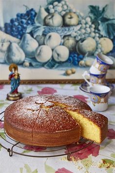 a cake is sitting on a plate with a piece cut out