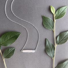 Modern and Minimal, our Maris bar necklace is the perfect accent to your everyday look. Crafted with a rectangle shaped and iridescent  pearl, this necklace is gorgeous on its own or as a layering necklace.  The sterling silver chain measures 14 in with a 2 inch extender which allows you to create the perfect fit with the pearl resting just below your collar bones.  Handcrafted in Seattle Hypoallergenic Sterling silver and fresh water pearl. Pearl Bar Necklace, Iridescent Pearl, September Birthstone Jewelry, August Birthstone Jewelry, July Birthstone Jewelry, Casting Jewelry, Gifts For New Mums, Pearl Jewellery Earrings, Jewelry Ring Box