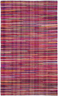 an area rug with multicolored stripes and fringes on the bottom, in various colors