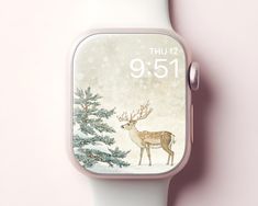 an apple watch with a deer and pine tree on the back side, in front of a pink background