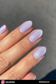 Soft and serene, these lavender velvet nails are like a calming whisper in a world of chaos. Ideal for when you need a little zen in your life. Purple Holographic Nails Designs, Light Purple Glitter Nails, Light Purple Nails With Glitter, Soft Purple Nails, Lavender Haze Nails, Glittery Purple Nails, Speak Now Nails, Purple Cat Eye Nails, Purple Sparkly Nails