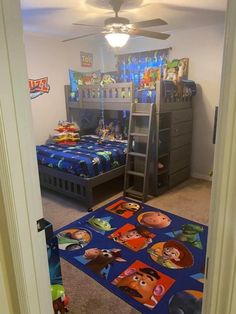 a bedroom with bunk beds and rugs on the floor