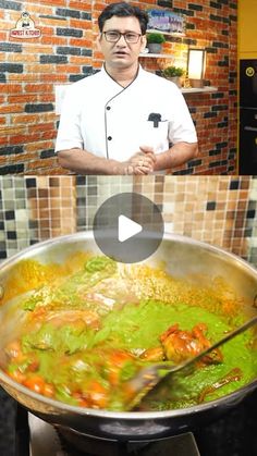 a man standing in front of a pan filled with food