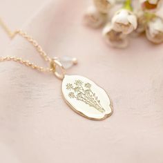 Our hand-finished Oval Birth Flower Personalised Necklace is designed to be perfectly imperfect, pairing hand-finished details with organic shapes and textures.Available in sterling silver and gold plated sterling silver, this necklace comes in a choice of two chain lengths. We have twelve beautifully hand-illustrated birth flowers to represent the birth month of your loved ones.These hand-etched pendants are reminiscent of paper-thin florals, pressed between pages to capture their unique beauty Jewellery Packing, Dainty Designs, Birthday Month Flowers, Soldered Jewelry, Birthday Stone, Personalised Necklace, Silver Clay, Cheap Necklaces, Product Shoot