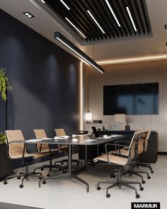 an empty conference room with chairs and a table