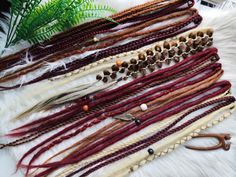 🔅🖥️ The color of the product may not match the color on your monitor. It depends on the settings of your monitor. 1 Clip holds 2 double ended dreadloks  Add some instant festival vibes to your look with these Clip In Dreads in Brown, Blonde, and Burgundy! These handcrafted synthetic extensions on clips are perfect for adding a touch of boho chic to your style in minutes. Whether you're heading to a music festival or just want to change up your everyday look, these colorful dreads are versatile and easy to style. Each set includes a mix of shades to create a unique and eye-catching blend. Embrace your adventurous side and stand out from the crowd with these trendy dreads. This item is made to order. Please kindly note that each new item might be slightly different from the original photo. Colorful Dreads, Clip In Dreads, Kanekalon Hairstyles, Solid Shampoo, Burgundy Hair, Synthetic Hair Extensions, Brown Blonde, Festival Vibes, Color Textures