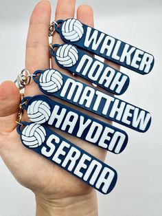 three key chains that say walker, noah, mathew, and hayed serra