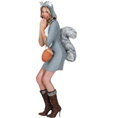 a woman dressed in a squirrel costume posing for the camera with her hand on her mouth