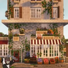 an animated image of a building with flowers on the windows and plants growing out of it