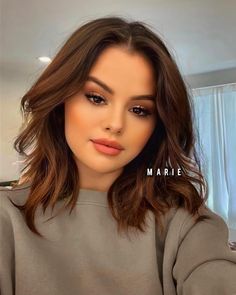 Longbob Hair Round Face, Trendy Shoulder Length Haircuts 2023, Brunette Round Face Hair, Haircuts For Wavy Hair Short Round Face, Brunette Bob Blue Eyes, Selena Gomez Hair 2023, Short Brown Hair With Curtain Bangs Wavy, Short Hair Circle Face Haircuts, Med Length Hairstyle Women Round Face