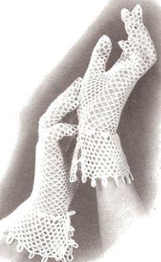 a white crocheted figure is shown in the shape of a woman's legs