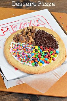 a birthday cake in a box with sprinkles and chocolate chips