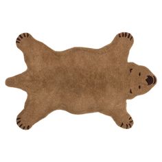 a brown bear rug is laying on the floor