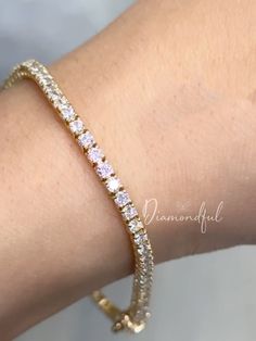 DETAILS: * Handmade item * Gemstone: Lab-grown Diamonds * Band Color: Gold (may vary on gold selection) * Condition: Never been Used; Made to order, Recycled Metal, Conflict-free 100% DESCRIPTION:  💎 Welcome to the Our Shop, Congratulations 🍾 on discovering us. 💎  Beautiful and Elegant, this women's Gold Tennis bracelet is a must-have. This custom-made to-order lab-grown diamond tennis bracelet is the perfect gift for all you beauties who love sparkle and shine. A row of scintillating lab-created round brilliant diamonds are lined up perfectly to create the most stunning diamond bracelet. Made with a double secure lock at the back. Thanks to our trained gemologist who inspects every one of them! A popular cut, this style has become one of today's favorites because it not only shines bri Dazzling Gold Tennis Bracelet For Wedding, Dazzling Gold Bracelet As Gift, Gold Dainty Tennis Bracelet With Prong Setting, Gold Jewelry Bracelet With Brilliant Cut, Dainty Yellow Gold Tennis Bracelet With Diamond Cut, Dainty Yellow Gold Bracelets With Prong Setting, 14k Gold Jubilee Tennis Bracelet For Wedding, Rose Gold 14k Tennis Bracelet With 17 Jewels, 14k Rose Gold Tennis Bracelet With Jewels