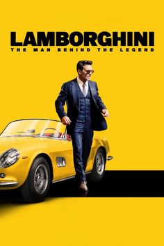 a man in a suit and tie standing next to a yellow car with the words lamborgchini on it