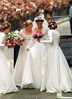 the brides are getting ready to walk down the street