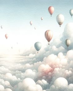 there are many hot air balloons flying in the sky above the clouds that look like they're floating