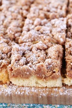 a close up of a cake with powdered sugar on it's toppings