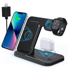 an apple watch charging station with two wireless devices connected to it and one charger