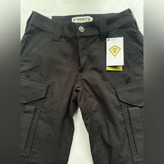 Nwt First Tactical V2 Women’s Tactical Pant. Size 4 Regular In Black. Black Military Bottoms For Outdoor, Black Military Style Outdoor Pants, Black Military Style Cargo Pants For Outdoor, Military Cargo Pants With Multiple Pockets For Outdoor Work, 5.11 Tactical Pants, Tactical Pants, Pant Jumpsuit, Pants For Women, Jumpsuit