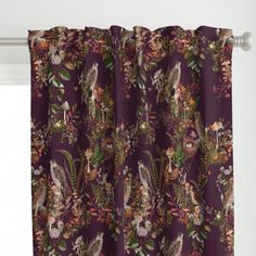 a curtain with birds and flowers on it