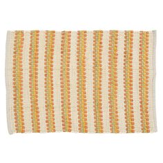 an orange and yellow striped rug on a white background with small circles in the middle